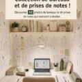 Un bureau d'étudiant organisé avec du matériel scolaire, une plante verte et une lumière naturelle