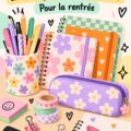 Matériel scolaire organisé sur un bureau élégant.